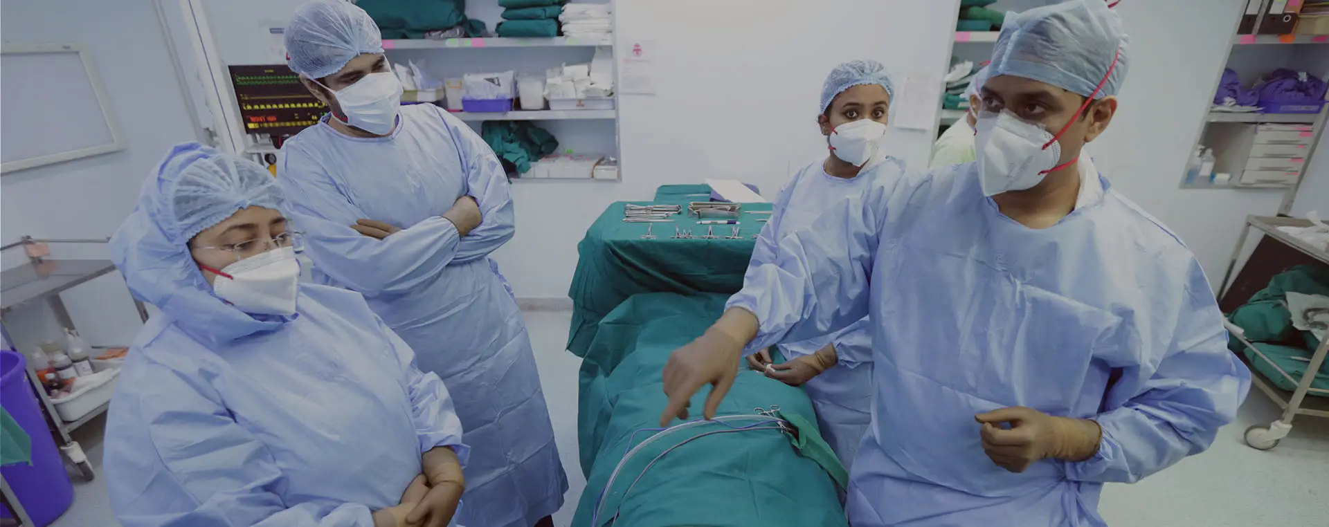 Dr. Date and the surgical team in theatre